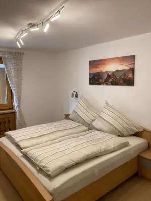 Ein Bett oder Betten in einem Zimmer der Unterkunft Ferienhaus Ehstand