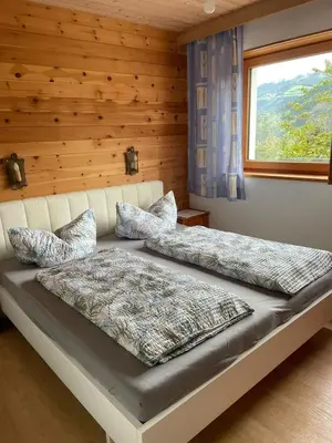 Ein Bett oder Betten in einem Zimmer der Unterkunft Gemütliche Wohnung mit voll ausgestatteter Küche