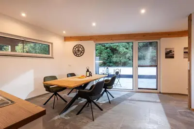 Ein Sitzbereich in der Unterkunft Apartment Mayr