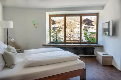 Ein Bett oder Betten in einem Zimmer der Unterkunft Hornweg Suites
