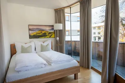 Ein Bett oder Betten in einem Zimmer der Unterkunft Hornweg Suites