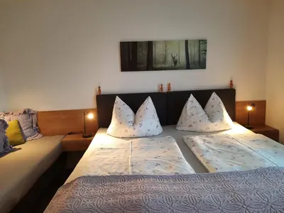 Ein Bett oder Betten in einem Zimmer der Unterkunft Ferienwohnung Neurauter