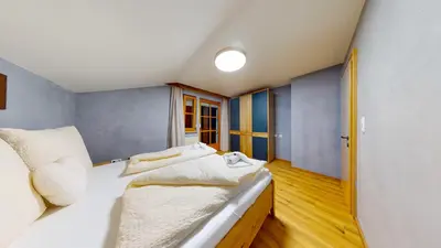 Ein Bett oder Betten in einem Zimmer der Unterkunft Chalet Wasserfall 52 mit Sauna