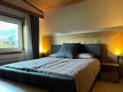 Ein Bett oder Betten in einem Zimmer der Unterkunft Cozy holiday home with mountain views