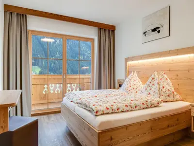 Ein Bett oder Betten in einem Zimmer der Unterkunft Apartment in Wald near Zillertal Ski Arena