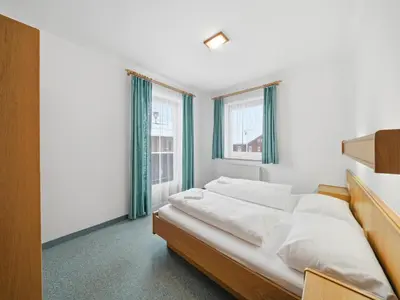 Ein Bett oder Betten in einem Zimmer der Unterkunft Apartment in Mittersill with mountain view