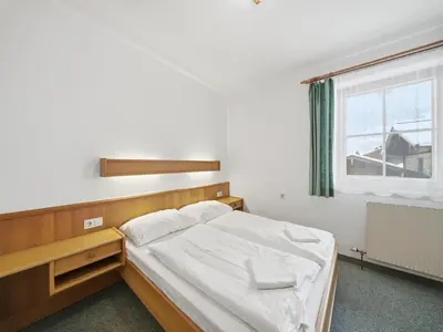 Ein Bett oder Betten in einem Zimmer der Unterkunft Apartment in Mittersill with mountain view