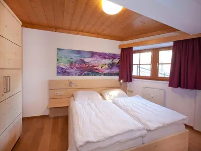 Ein Bett oder Betten in einem Zimmer der Unterkunft Chalet in Pinzgau near Ski Slopes