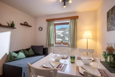 Ein Sitzbereich in der Unterkunft Apartment Bergblick