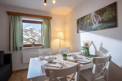 Ein Sitzbereich in der Unterkunft Apartment Bergblick