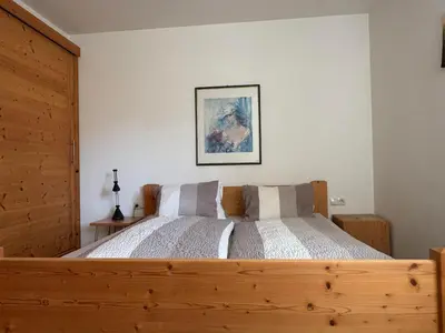 Ein Bett oder Betten in einem Zimmer der Unterkunft Ferienwohnung Eichenspaziert