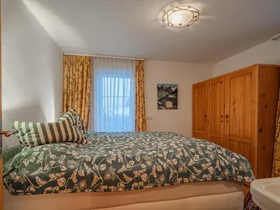 Ein Bett oder Betten in einem Zimmer der Unterkunft Haus David