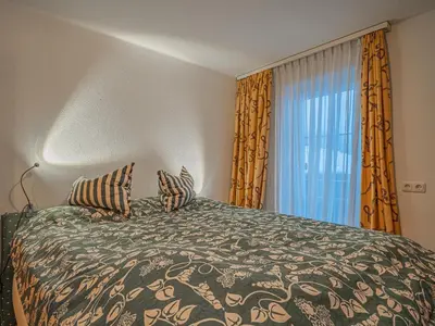 Ein Bett oder Betten in einem Zimmer der Unterkunft Haus David