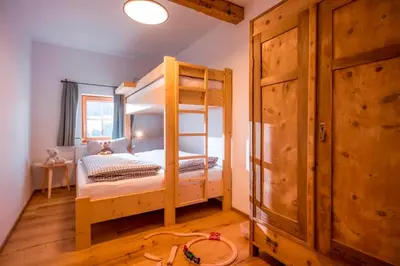 Ein Bett oder Betten in einem Zimmer der Unterkunft Drittlhof