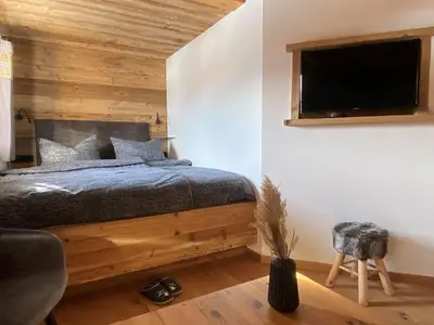 Ein Bett oder Betten in einem Zimmer der Unterkunft Chalet 121