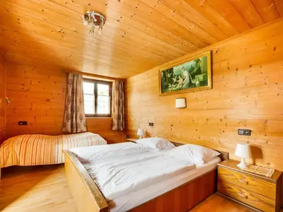 Ein Bett oder Betten in einem Zimmer der Unterkunft Chalet in Jochberg near Thurn Pass Skiing