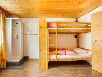 Ein Bett oder Betten in einem Zimmer der Unterkunft Chalet in Jochberg near Thurn Pass Skiing