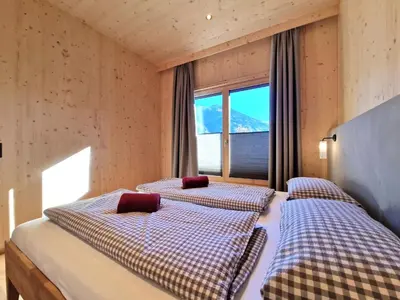 Ein Bett oder Betten in einem Zimmer der Unterkunft Apartment Schanzlbichl-1 by Interhome