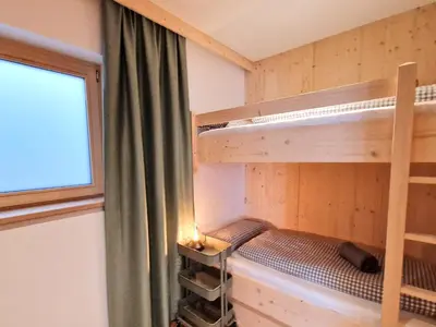 Ein Bett oder Betten in einem Zimmer der Unterkunft Apartment Schanzlbichl-3 by Interhome