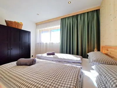 Ein Bett oder Betten in einem Zimmer der Unterkunft Apartment Schanzlbichl-3 by Interhome