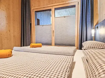 Ein Bett oder Betten in einem Zimmer der Unterkunft Apartment Schanzlbichl-2 by Interhome