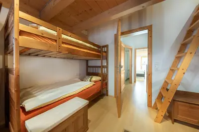 Ein Bett oder Betten in einem Zimmer der Unterkunft Haus Alpenruhe