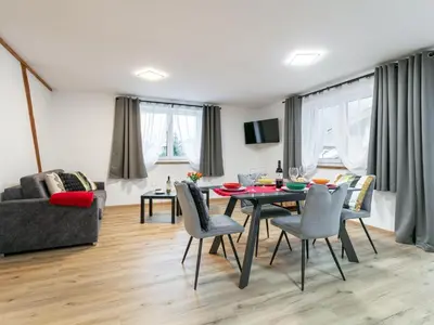 Ein Sitzbereich in der Unterkunft Tennerhof Apartments Top 2