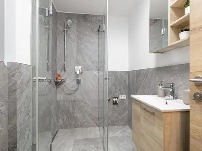 Ein Badezimmer in der Unterkunft Tennerhof Apartments Top 2