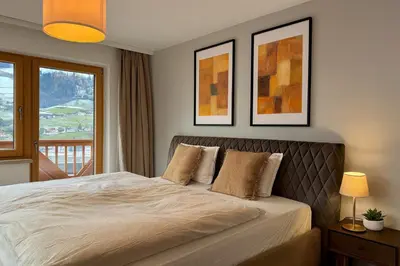 Ein Bett oder Betten in einem Zimmer der Unterkunft Gästehaus Maria