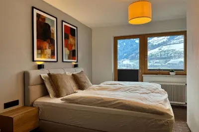 Ein Bett oder Betten in einem Zimmer der Unterkunft Gästehaus Maria