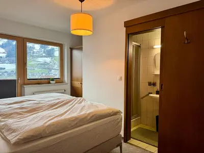 Ein Bett oder Betten in einem Zimmer der Unterkunft Gästehaus Maria