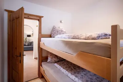 Ein Bett oder Betten in einem Zimmer der Unterkunft Ferienwohnung am Penningberg