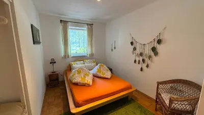Ein Bett oder Betten in einem Zimmer der Unterkunft Ferienwohnungen Margret