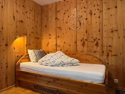 Ein Bett oder Betten in einem Zimmer der Unterkunft Ferienwohnungen Margret