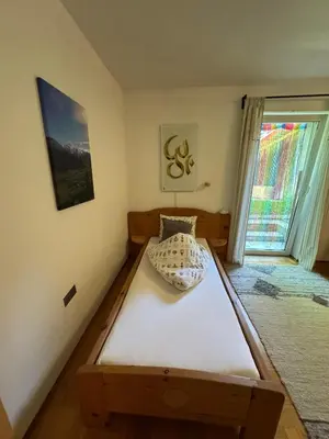 Ein Bett oder Betten in einem Zimmer der Unterkunft Ferienwohnungen Margret