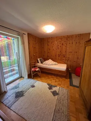Ein Bett oder Betten in einem Zimmer der Unterkunft Ferienwohnungen Margret