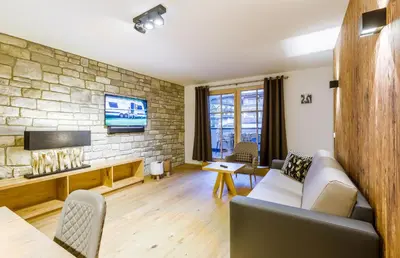 TV/Unterhaltungsangebot in der Unterkunft Bolodges Apartments by Alpin Rentals