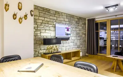 TV/Unterhaltungsangebot in der Unterkunft Bolodges Apartments by Alpin Rentals