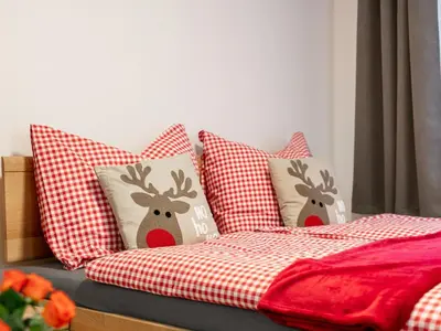 Ein Bett oder Betten in einem Zimmer der Unterkunft Tennerhof Apartments Top 1 2 3