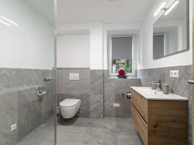 Ein Badezimmer in der Unterkunft Tennerhof Apartments Top 1 2 3