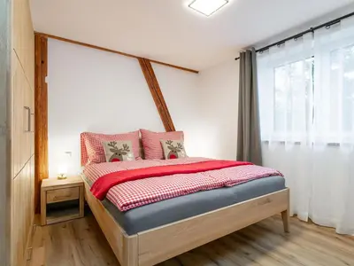 Ein Bett oder Betten in einem Zimmer der Unterkunft Tennerhof Apartments Top 1 2 3