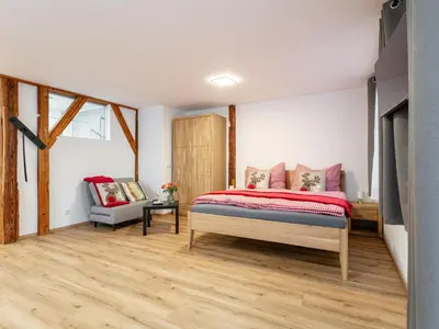 Ein Bett oder Betten in einem Zimmer der Unterkunft Tennerhof Apartments Top 1 und Top 2