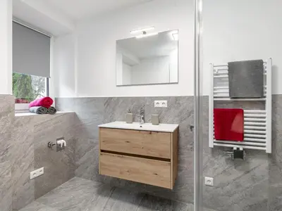 Ein Badezimmer in der Unterkunft Tennerhof Apartments Top 3