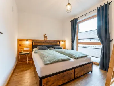 Ein Bett oder Betten in einem Zimmer der Unterkunft Tauernapart I und II