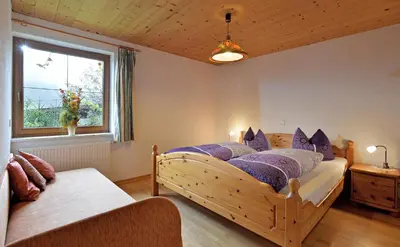 Ein Bett oder Betten in einem Zimmer der Unterkunft Haus Sonnenschein