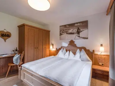 Ein Bett oder Betten in einem Zimmer der Unterkunft Holiday apartment Alpenrose in Huaterhof