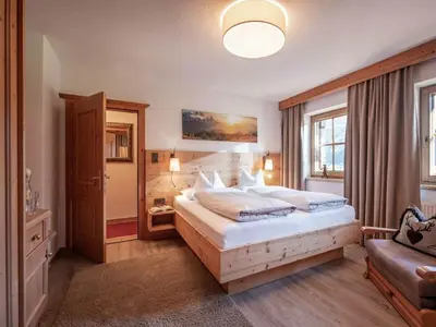 Ein Bett oder Betten in einem Zimmer der Unterkunft Holiday apartment Tristnerblick in the Huaterhof