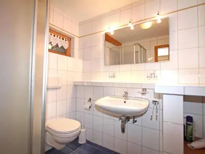 Ein Badezimmer in der Unterkunft Königsleiten Tauernblick