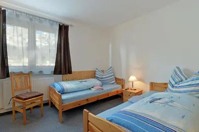 Ein Bett oder Betten in einem Zimmer der Unterkunft Waldhof
