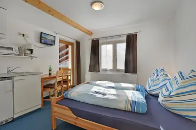 Ein Bett oder Betten in einem Zimmer der Unterkunft Waldhof